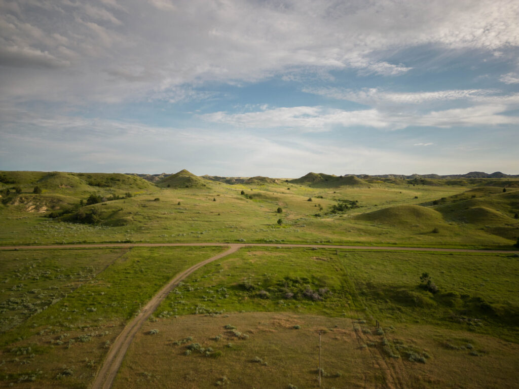 Drone view of small paddocks and roads